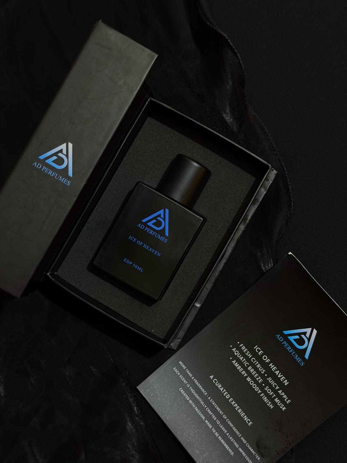 Open black gift box containing AD Perfumes Ice of Heaven EDP 50 ml